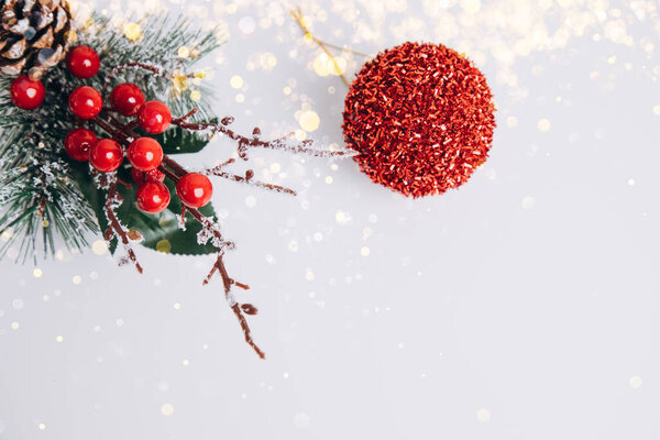 New Years, Christmas decor red-green on a white background in yellow lights. Flat lay