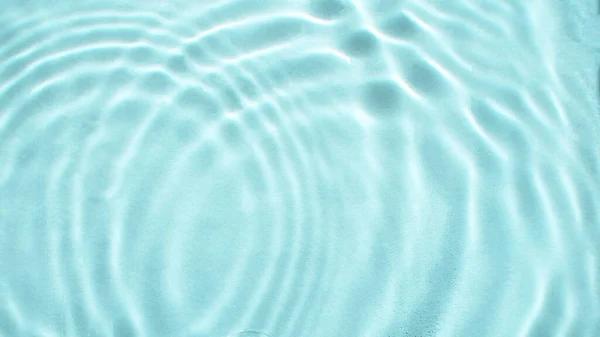 stock image Abstract nature textured background, water waves in the pool with sun reflection, clear blue water. Web banner