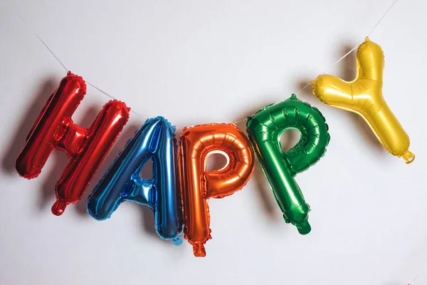 Balões Infláveis Feitos Folha Colorida Forma Letras Inscrição Multicolorida Feliz — Fotografia de Stock