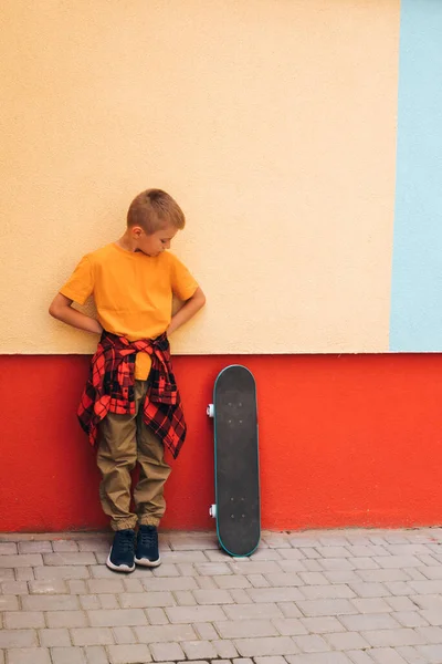 Outdoor Activities Children Cheerful Young Boy Bright Clothes Skateboard Backdrop — Stock Photo, Image