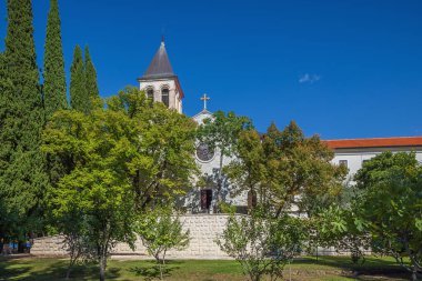 In the garden of the Visovac Monastery in the Krka National Park