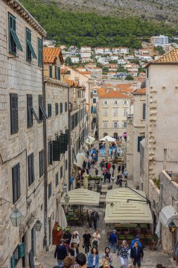 Editorial: DUBROVNIK, DALMATIA, CROATIA, SEPTEMBER 25, 2022 - The Jesuit Street in Dubrovnik filled with tourists, seen from the Jesuit Stairs