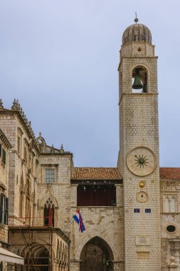 The City Clock Tower at the end of the Stradun. The plaque says HERE IN FRONT OF THE CHURCH OF SAINT VLAHO, JUNE 6, 2003 POPE JOHN PAUL II BLESSED THE CITY