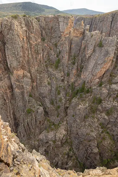 Deep gorges in the north rim of the Black Canyon of the Gunnison at Devil\'s Lookout on the south rim