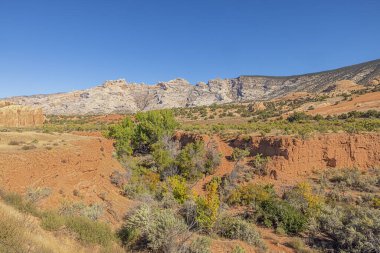 Red canyons near Turtle Rock next to Cub Creek Road in the Dinosaur National Monument clipart