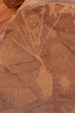 Drawing of a vase with flowers at the Cub Creek petroglyphs in the Dinosaur National Monument drawn by the Fremont people clipart