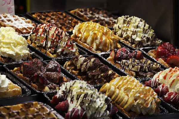 stock image antalize your senses with this mouthwatering photograph of authentic Belgian waffles, freshly made in the heart of Brussels. The image captures the waffles golden-brown exterior, fluffy interior, and