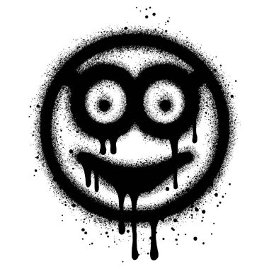 Sprey boyalı graffiti gülen yüz ifadesi.