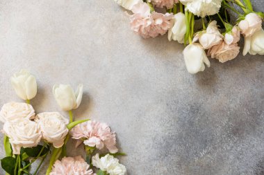 Beautiful spring flowers greeting card. Flower composition for holiday Valentine's Day, Women's Day, birthday, mothers day. View from above. 