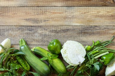 Healthy eating clean eating. Assorted green vegetables, fresh organic raw food. View from above. Copy space.