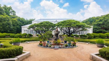 Seoul, South Korea, August 6, 2023: The Grand Greenhouse in Changgyeonggung Palace is the first Western-style greenhouse in South Korea. clipart