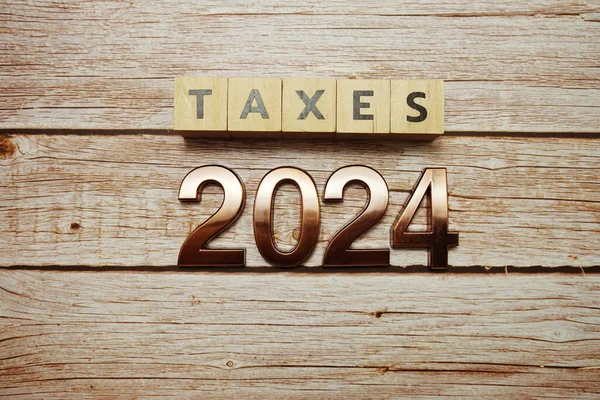 Taxes 2024 Alphabet Letter Wooden Background — Stock Photo, Image