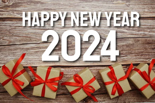 Щасливий Новий Рік 2024 Друкарський Текст Подарунковою Коробкою Дерев Яному — стокове фото