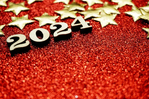Happy New year 2024 with space copy on red glitter background