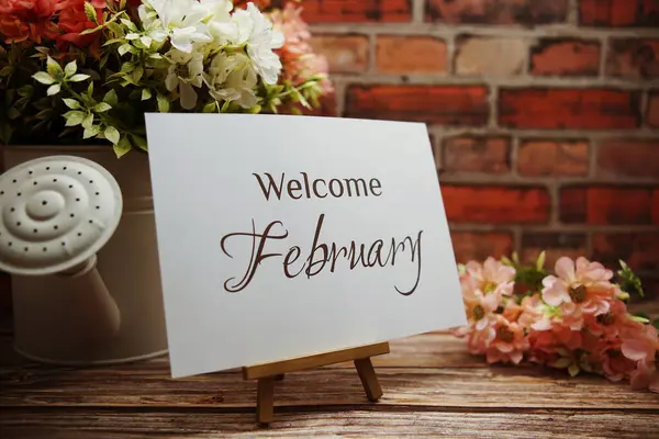 Welcome February Text Flower Bouquet Decoration Wooden Old Brick Wall — Stock Photo, Image