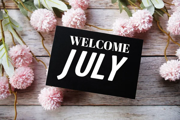 Welcome July Text Message Flower Decoration Wooden Background — Stock Photo, Image
