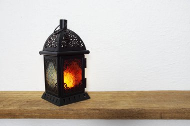 Ramadan Lantern Arabic decoration on wooden shelves