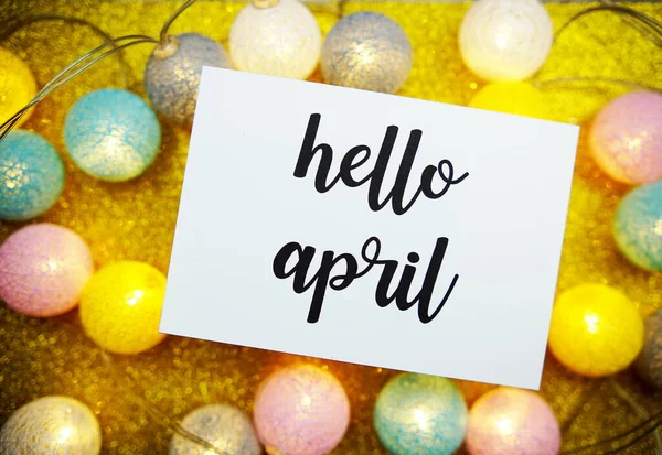 Hello April Text Paper Card Top View Yellow Bokeh Background — Stock Photo, Image