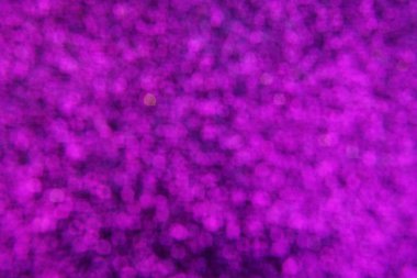 Odaklanamayan soyut parlak, parlak, mor parıltılı arkaplan