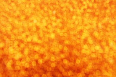 Soyut odaklanmış parlak, pırıl pırıl altın parıltılı arkaplan