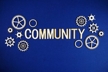 Lacivert arkaplan üzerinde vites ögesi olan topluluk alfabesi harfleri