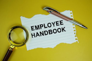 Kağıda yazılan, büyüteç düzlüğü sarı arkaplanda olan, İşçi El Kitabı metni