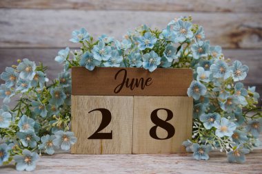 Ahşap Takvim 28 Haziran 'ı gösteriyor. 28. gün