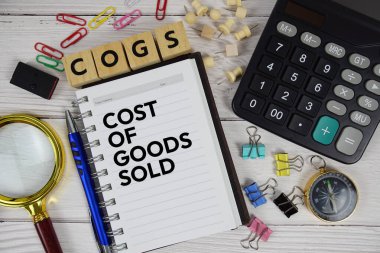 COGS - Malların Maliyeti Not defterine, iş ve finansal konsept geçmişine kısaltma satıldı
