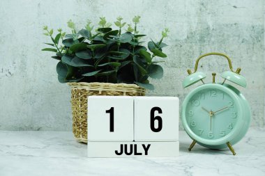 Wooden Calendar Showing the Date of July 16th. Day 16 of July month