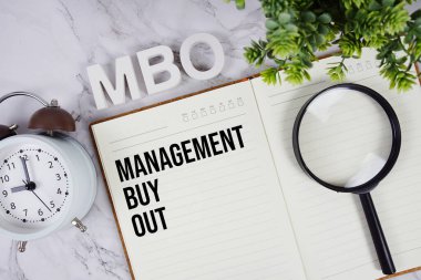 MBO - Not defterinde yönetim satın alma kısaltması, iş konsepti geçmişi