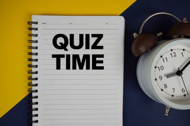 Not defterine yazılan Sınav Zamanı metni ve sarı arkaplanda alarm saati