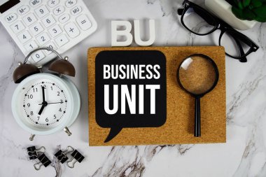 BU - Hesap makinesi, çalar saat ve büyüteç ile iş birimi kısaltması, iş konsepti geçmişi