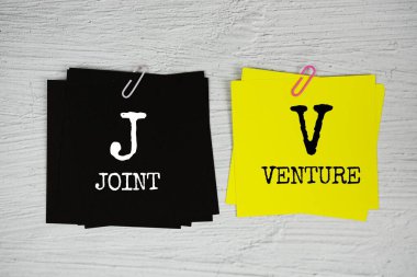 JV - Beton arkaplan üzerine Joint Venture metni