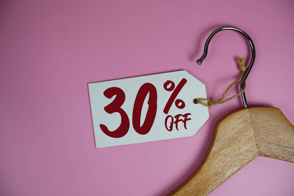 Sale 30% off price tag label with Clothes hanger Clothing Promotion shopping concept