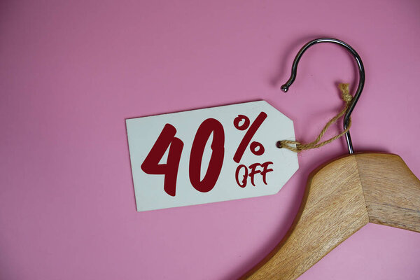 Sale 40% off price tag label with Clothes hanger Clothing Promotion shopping concept