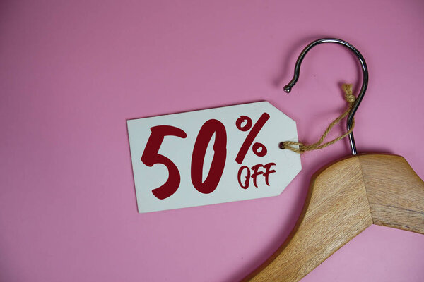 Sale 50% off price tag label with Clothes hanger Clothing Promotion shopping concept