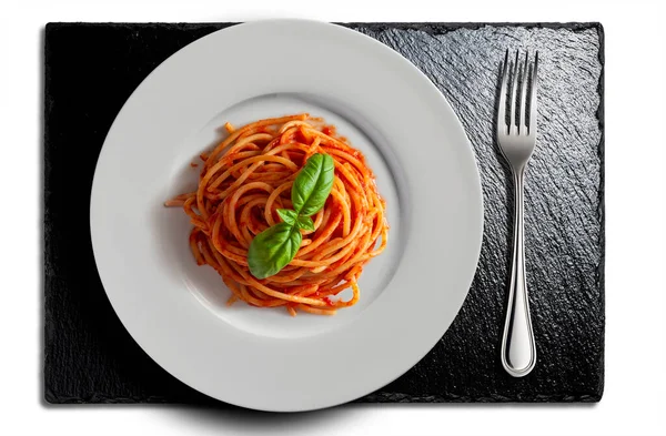 Vista Superior Placa Branca Com Espaguete Tomate Garfo Manjericão Pedra — Fotografia de Stock