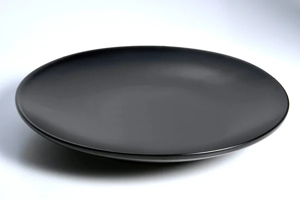 Empty Black Plate Rounded Edges White Background — Stock Photo, Image