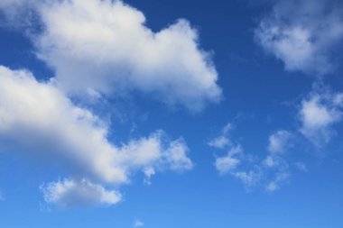 White clouds and a blue sky. Cloudscape.