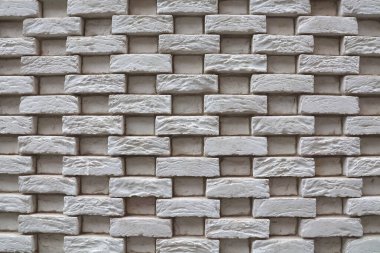 Rahatlamak için beyaz tuğlalar. Taş zemin. Beyaz tuğla duvar.