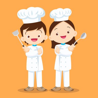 Cute Boy and Girl cooking in the kitchen. happy little chef kids presenting.
