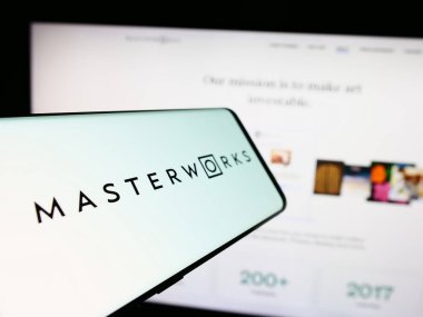 Stuttgart, Germany - 05-16-2024: Mobile phone with logo of US art investment company Masterworks LLC in front of business website. Focus on center-left of phone display. clipart