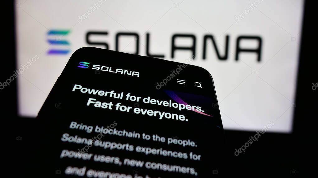 Stuttgart, Germany - 08-18-2024: Smartphone with website of blockchain platform company Solana in front of business logo. Focus on top-left of phone display.