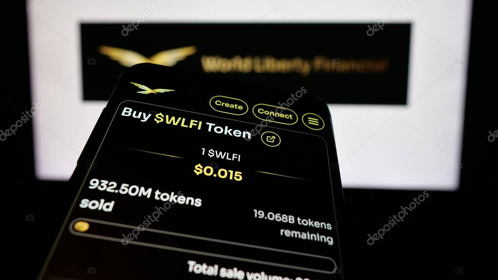 Stuttgart, Germany - 10-22-2024: Smartphone with website of US crypto company World Liberty Financial Inc. on screen in front of business logo. Focus on top-left of phone display.