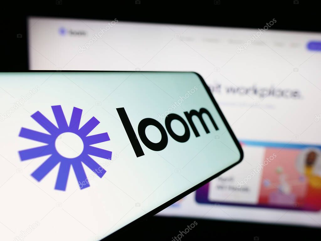 Stuttgart, Germany - 12-29-2023: Smartphone with logo of American video communication software company Loom Inc. in front of business website. Focus on center of phone display.