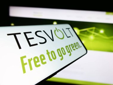 Stuttgart, Germany - 04-17-2024: Smartphone with logo of German energy storage company TESVOLT AG in front of business website. Focus on left of phone display. clipart