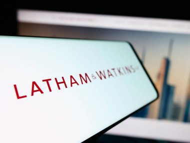 Stuttgart, Germany - 12-17-2023: Smartphone with logo of American law firm Latham and Watkins LLP (LW) in front of business website. Focus on left of phone display. clipart