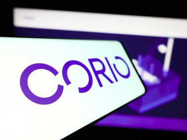 Stuttgart, Almanya - 11-06-2023: Yenilenebilir enerji yatırım şirketi Corio Generation Limited 'in logosuna sahip cep telefonu işletme web sitesi önünde. Telefon ekranının soluna odaklan.