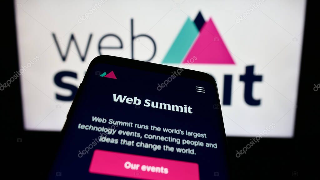 Stuttgart, Germany - 11-06-2023: Mobile phone with website of annual technology conference Web Summit (Lisbon) in front of business logo. Focus on top-left of phone display.