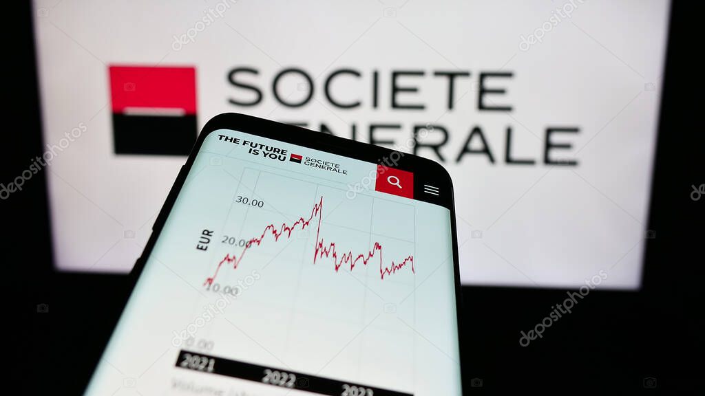 Stuttgart, Germany - 09-28-2023: Mobile phone with website of French financial services company Societe Generale S.A. in front of logo. Focus on top-left of phone display.